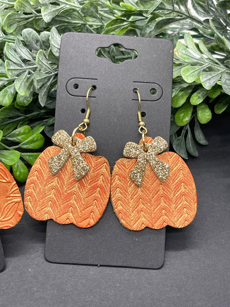 Pumpkin Shaped Embossed Orange Leather Earrings with Gold Glaze and Bows