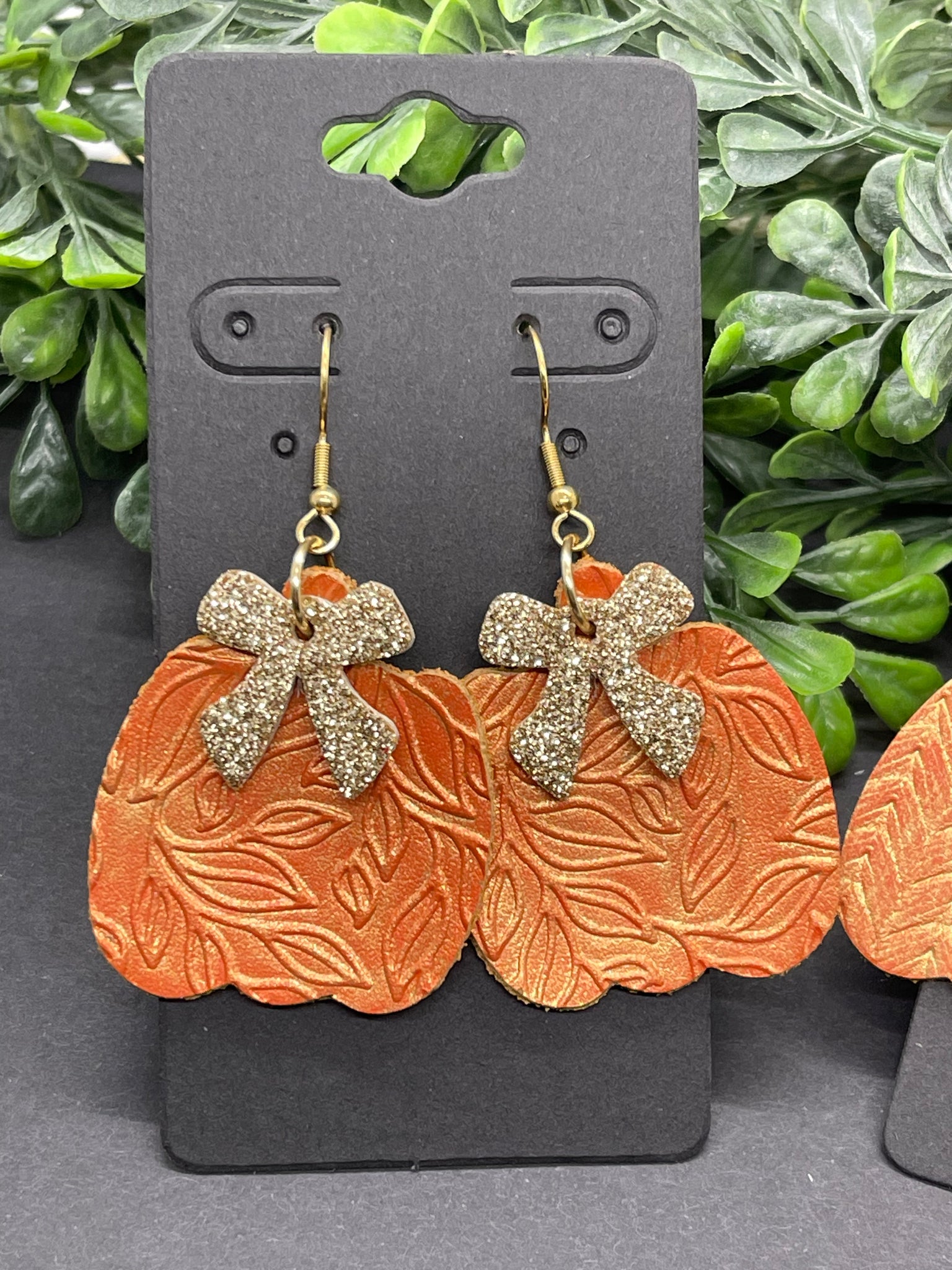 Pumpkin Shaped Embossed Orange Leather Earrings with Gold Glaze and Bows