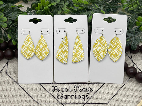 White and Yellow Swirl Print Leather Earrings