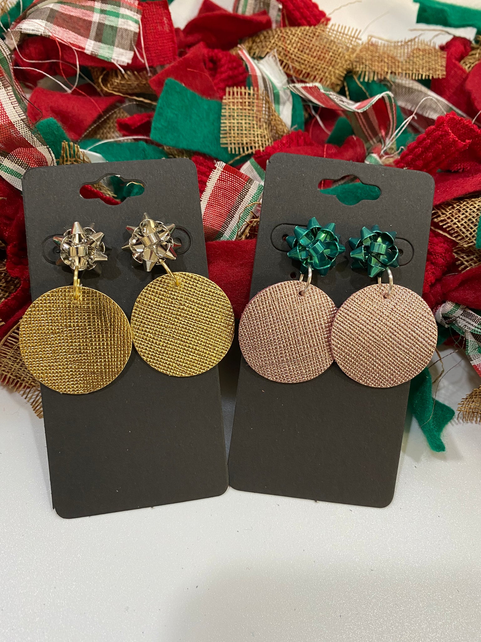 Silver Christmas Bow with a Gold Metallic Saffiano Leather Circle Earrings