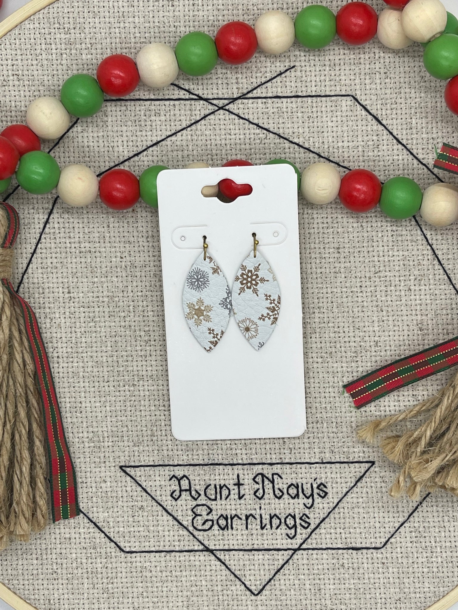 White Leather with Silver and Gold Snowflake Print Earrings