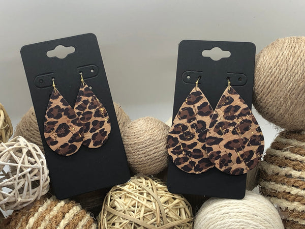 Black and brown leopard print on cork with hints of gold