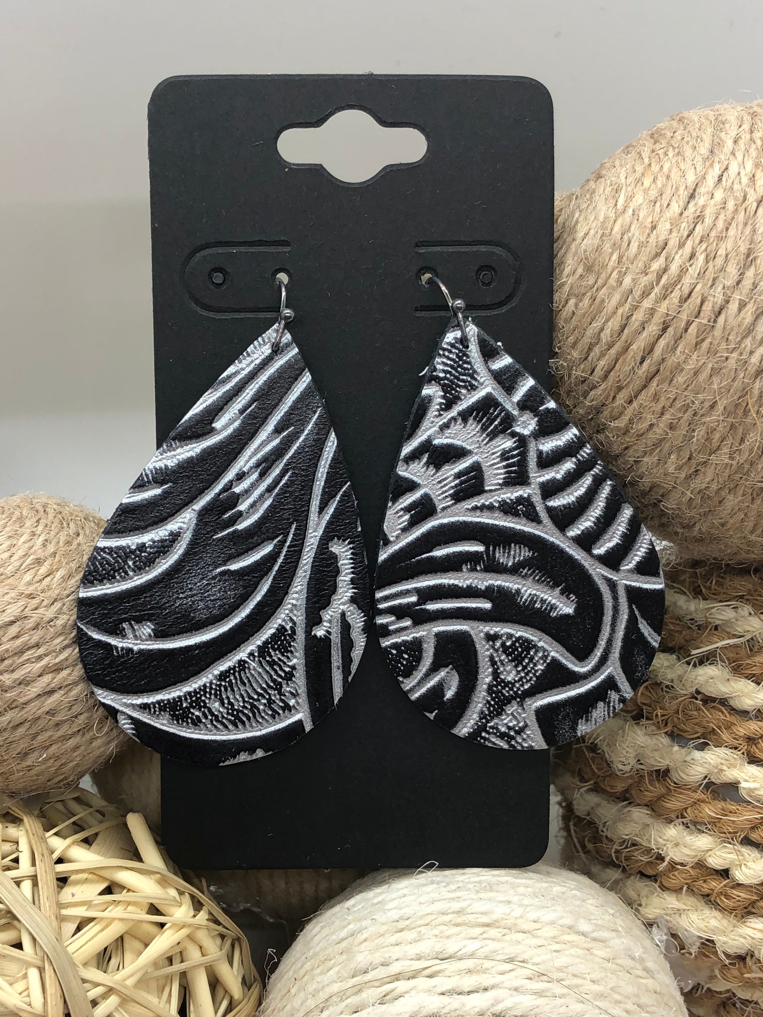 Black Leather with a Swirly Silver Tooled Texture Earrings