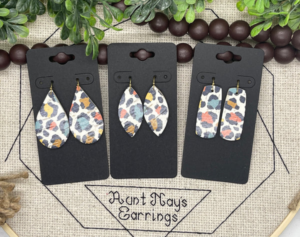 White Cork with Black Teal Mustard Yellow and Dark Orange Leopard Print on Leather Earrings
