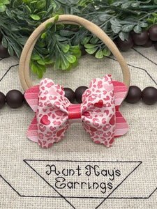 Pink Leopard Heart print faux leather hair bow